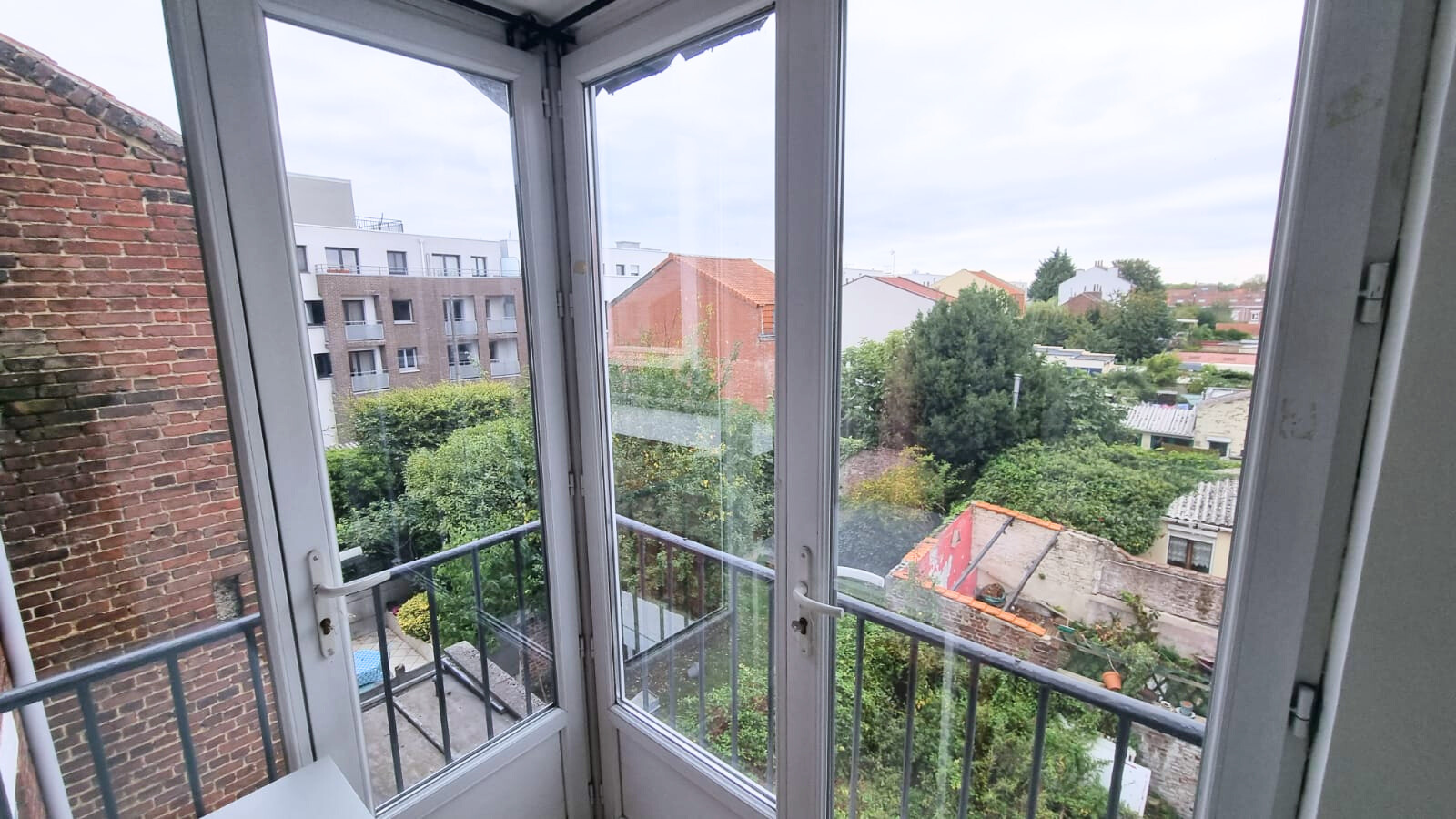 Immeuble de rapport comportant 3 appartements avec caves Photo 7 - Brique Rouge Immobilier