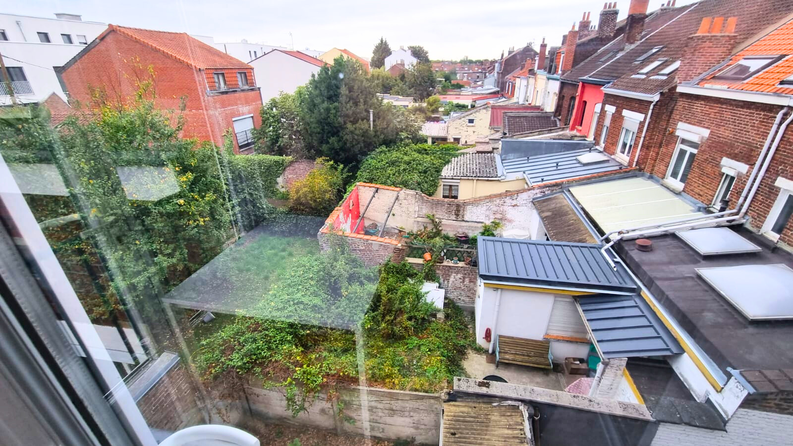 Immeuble de rapport comportant 3 appartements avec caves Photo 8 - Brique Rouge Immobilier