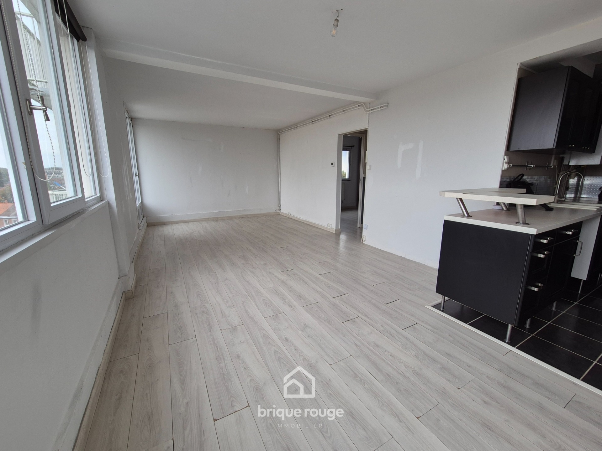 T2 de 50 m2 parking Photo 1 - Brique Rouge Immobilier T2 de 50 m2 parking Photo 1 - Brique Rouge Immobilier