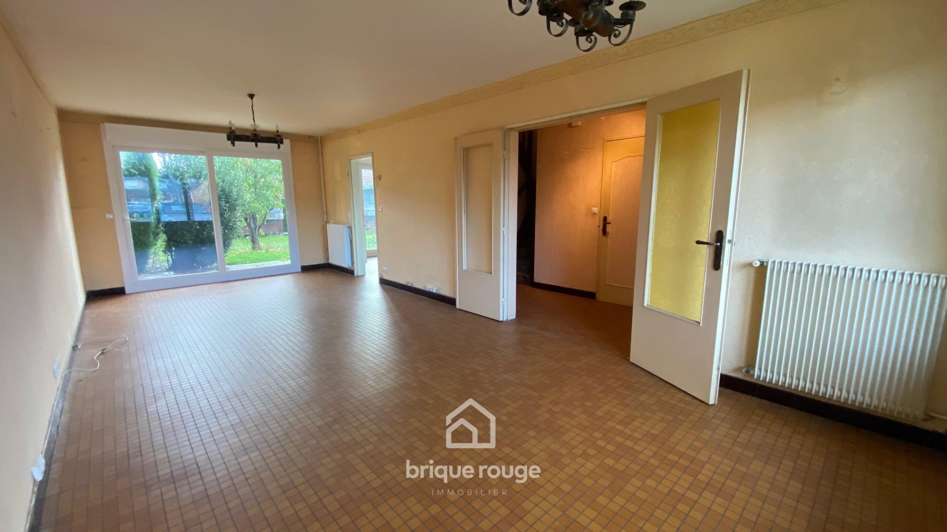 Maison de lotissement 3 chambres  jardin garage Photo 1 - Brique Rouge Immobilier