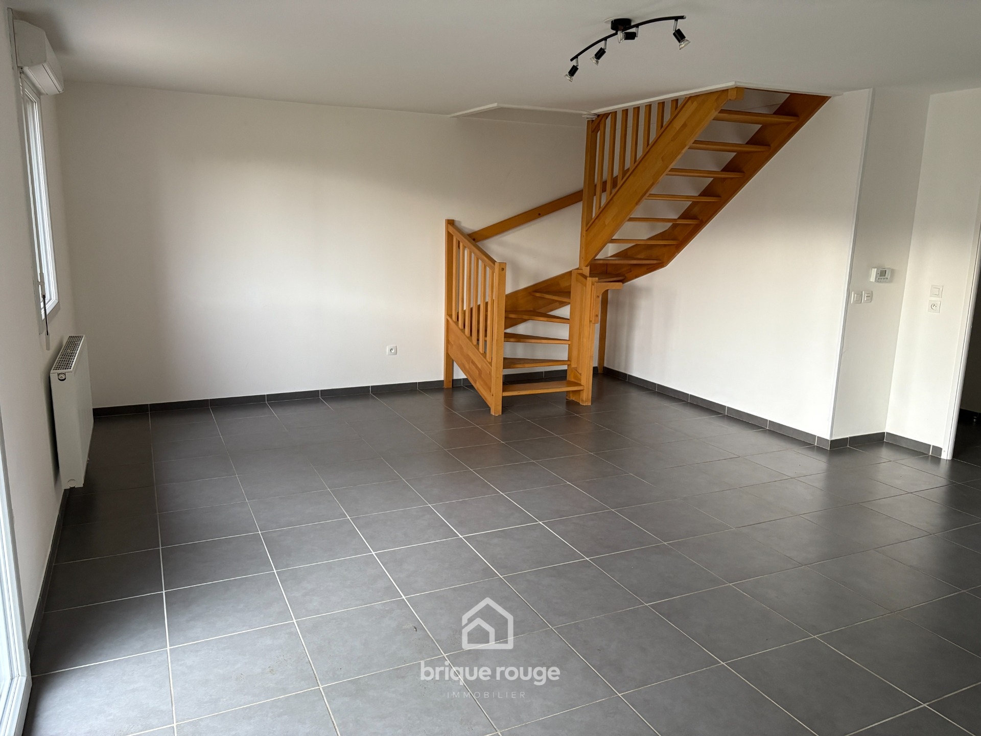 Maison semi individuelle bois grenier Photo 2 - Brique Rouge Immobilier