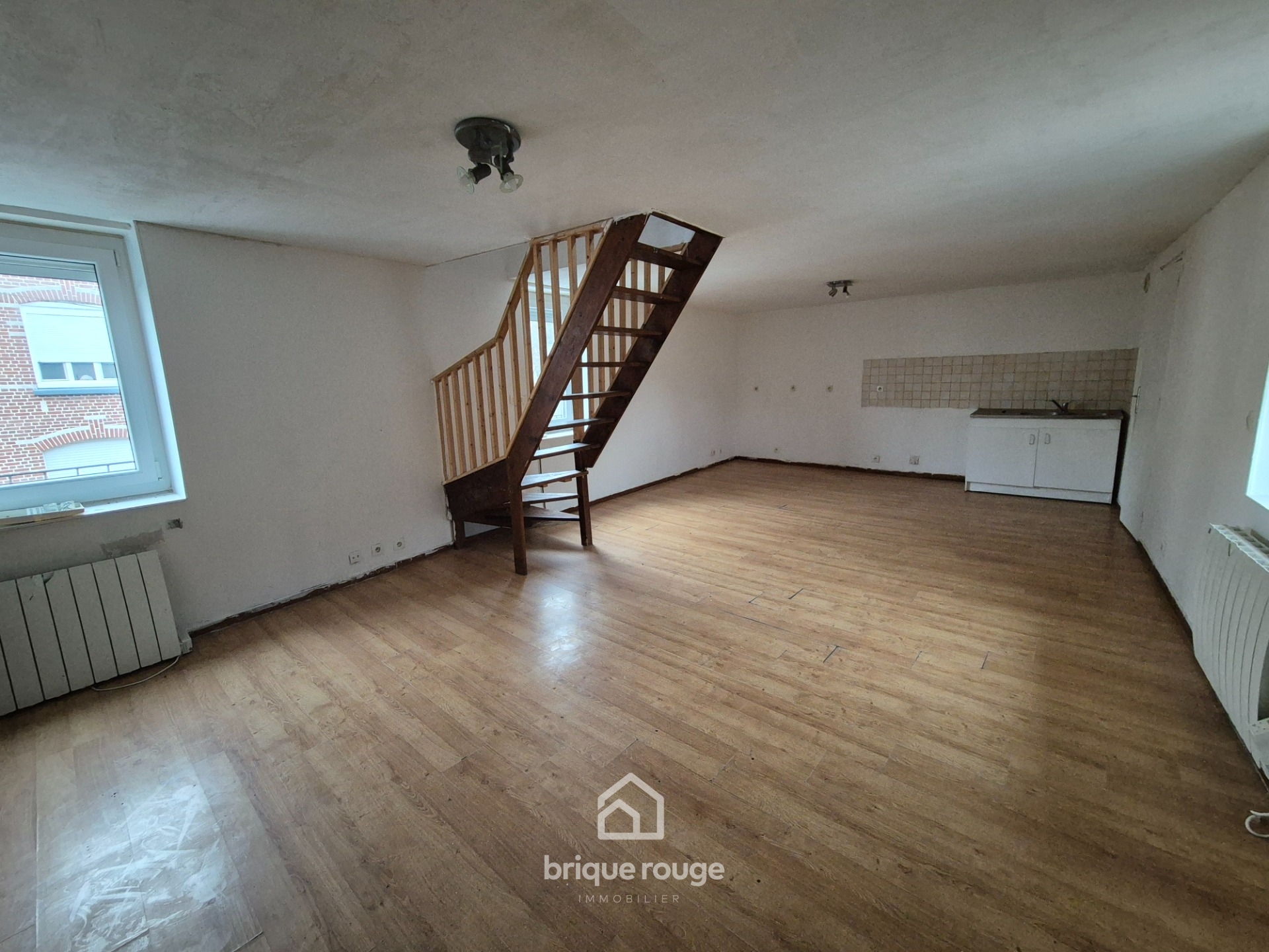 T3 duplex de 54m Photo 2 - Brique Rouge Immobilier T3 duplex de 54m Photo 2 - Brique Rouge Immobilier