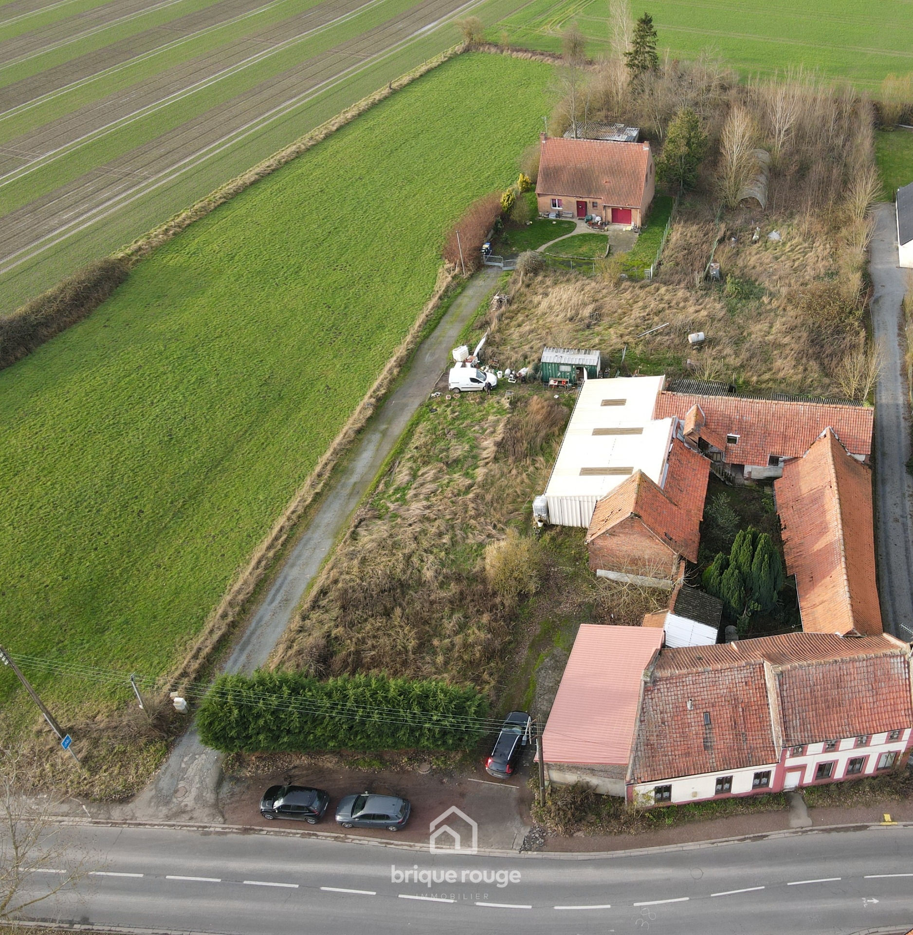 Opportunite rare   une ferme carree  reinventer  Photo 1 - Brique Rouge Immobilier
