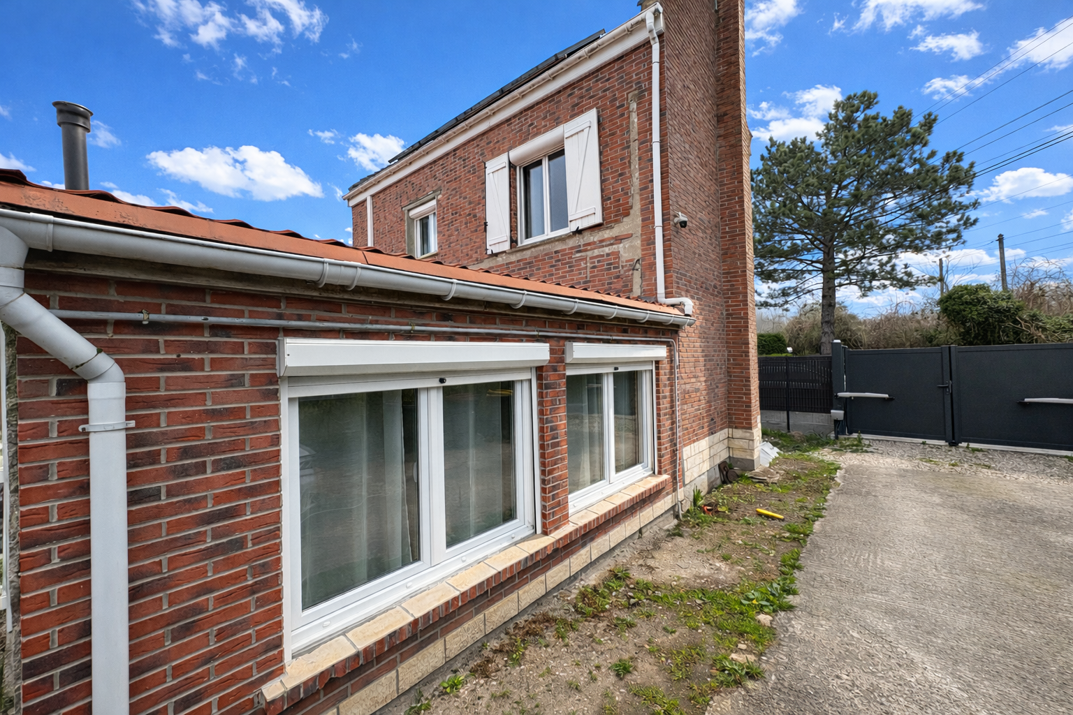 Maison individuelle Photo 1 - Brique Rouge Immobilier