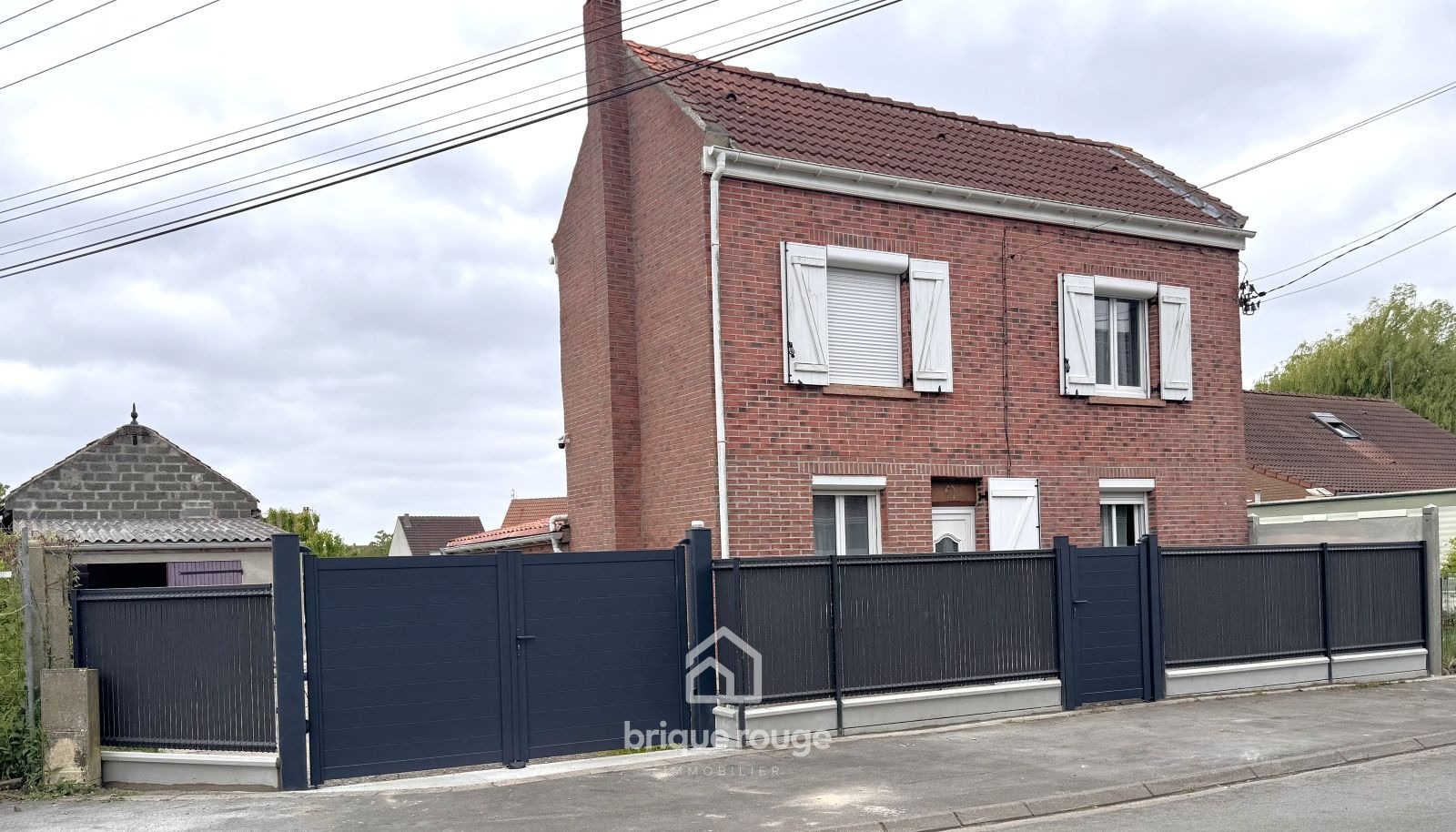 Maison individuelle Photo 1 - Brique Rouge Immobilier