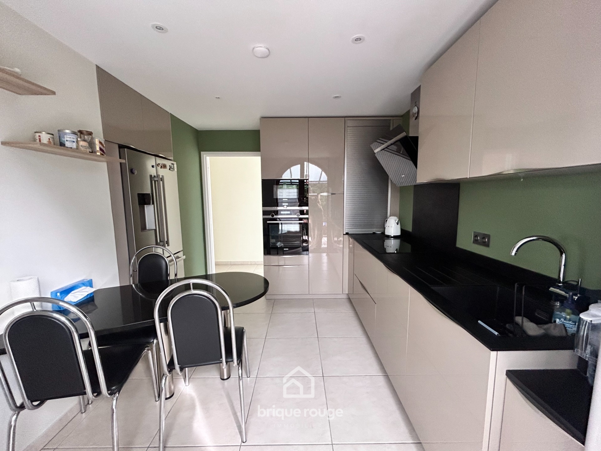 Plain pied individuel avec jardin et garage Photo 3 - Brique Rouge Immobilier