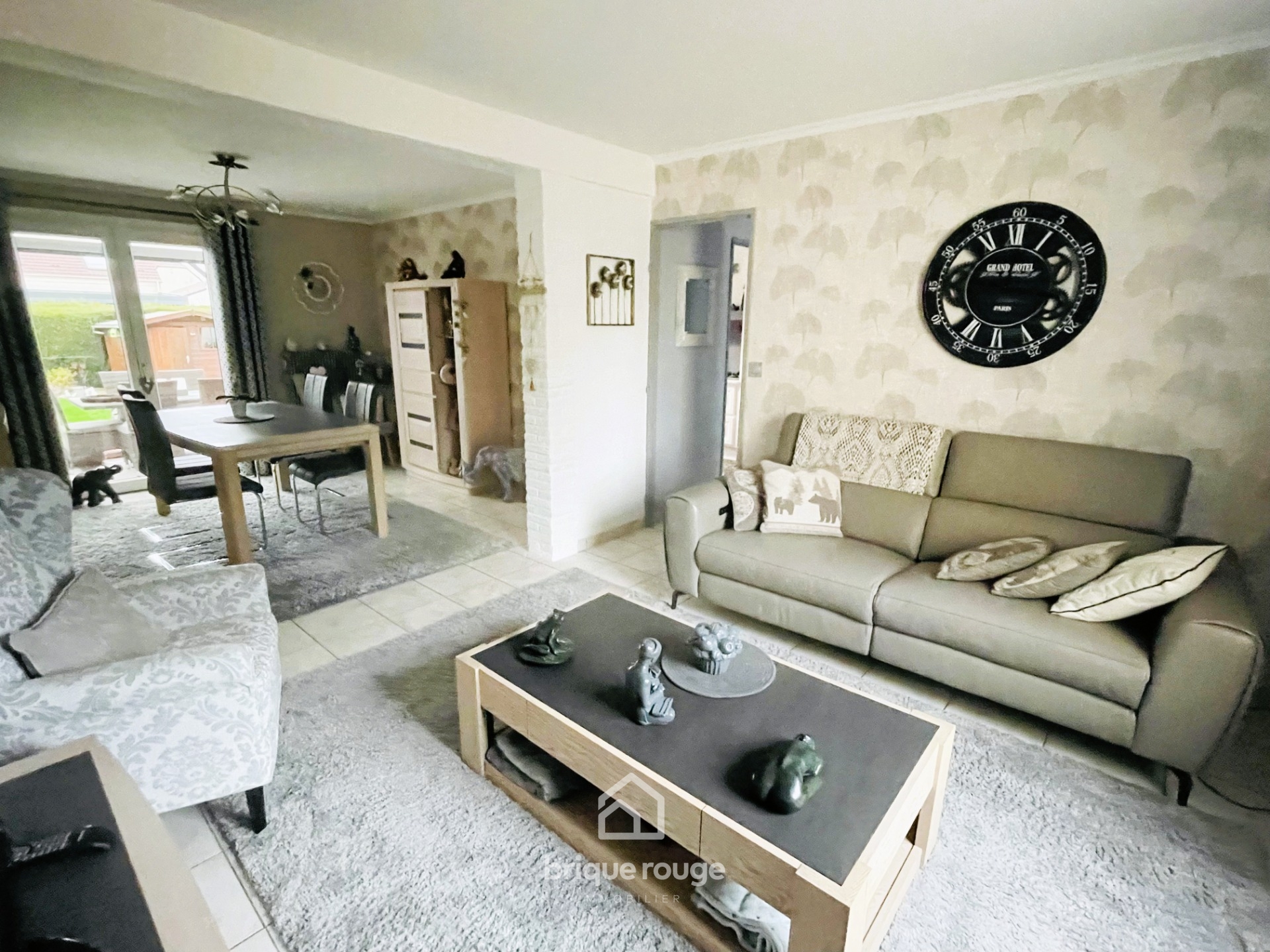 Maison confortable avec 3 chambres garage et jardin Photo 1 - Brique Rouge Immobilier