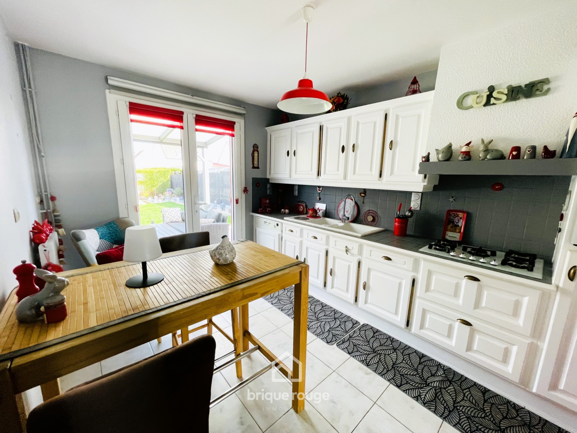 Maison confortable avec 3 chambres garage et jardin Photo 3 - Brique Rouge Immobilier