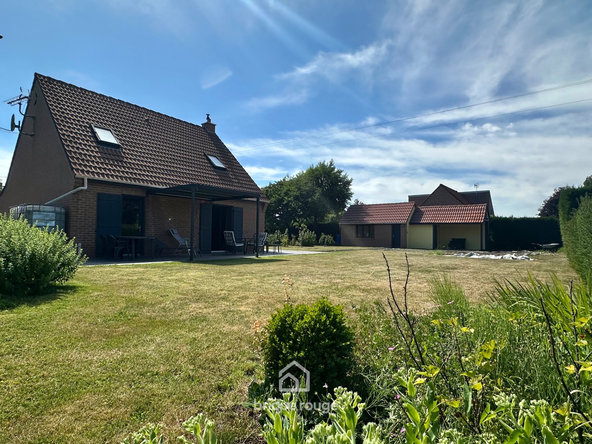 Individuelle 3 chambres garage sur   de 1000m Photo 1 - Brique Rouge Immobilier