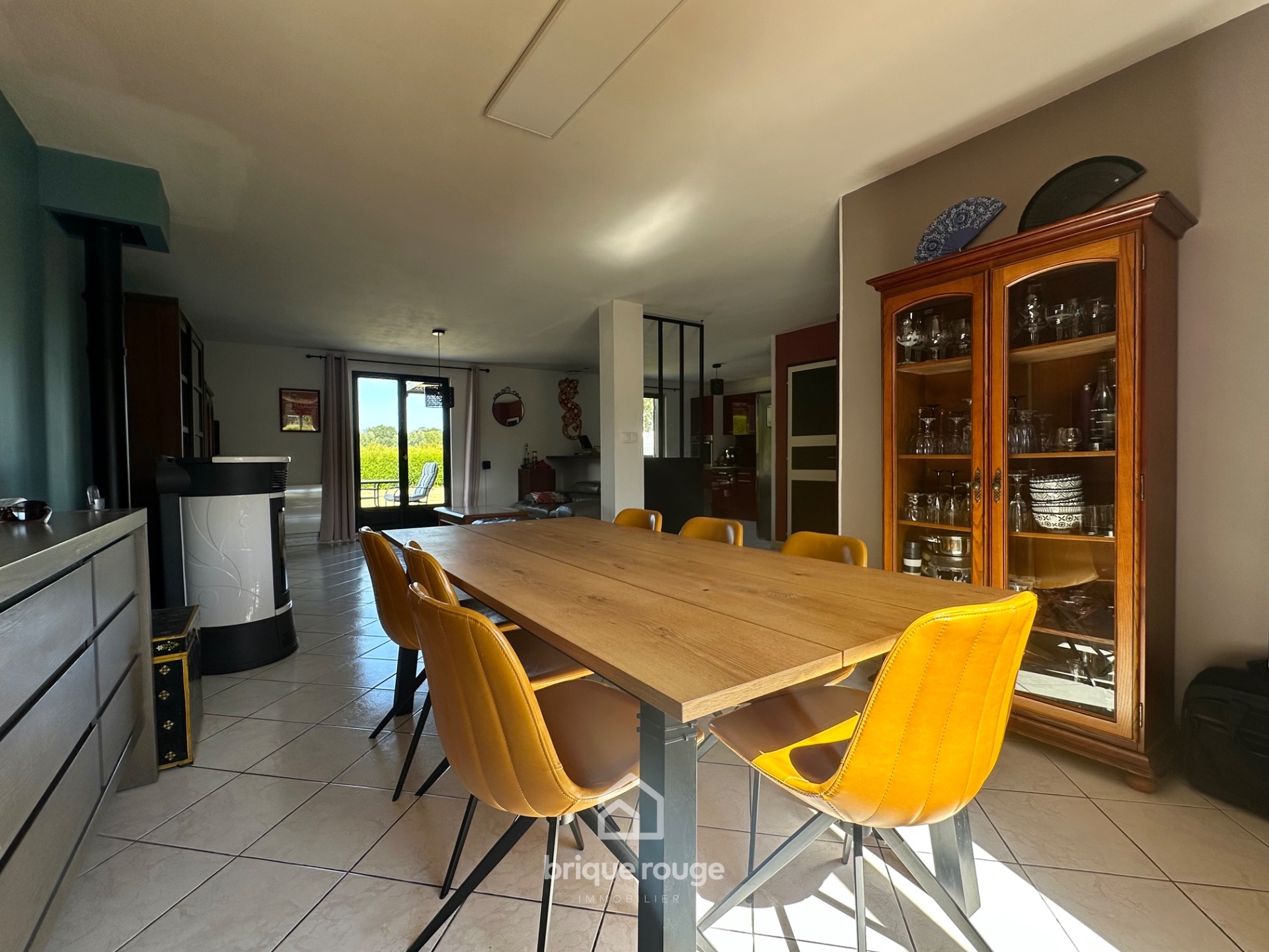 Individuelle 3 chambres garage sur   de 1000m Photo 2 - Brique Rouge Immobilier