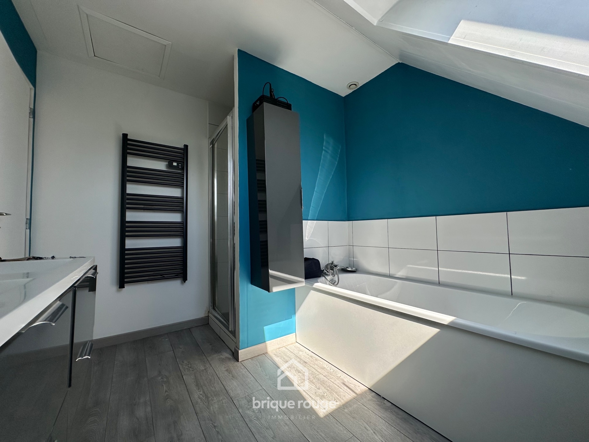 Individuelle 3 chambres garage sur   de 1000m Photo 5 - Brique Rouge Immobilier
