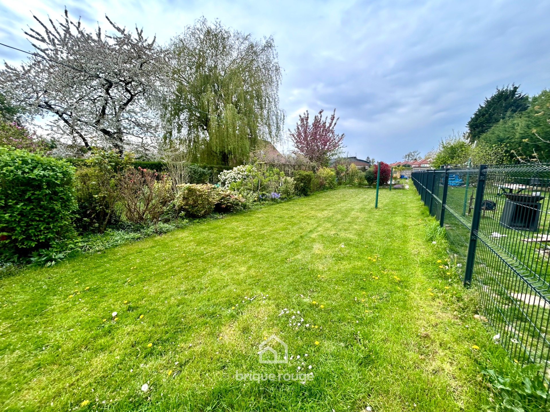 Belle maison avec grand jardin et garage Photo 6 - Brique Rouge Immobilier Belle maison avec grand jardin et garage Photo 6 - Brique Rouge Immobilier