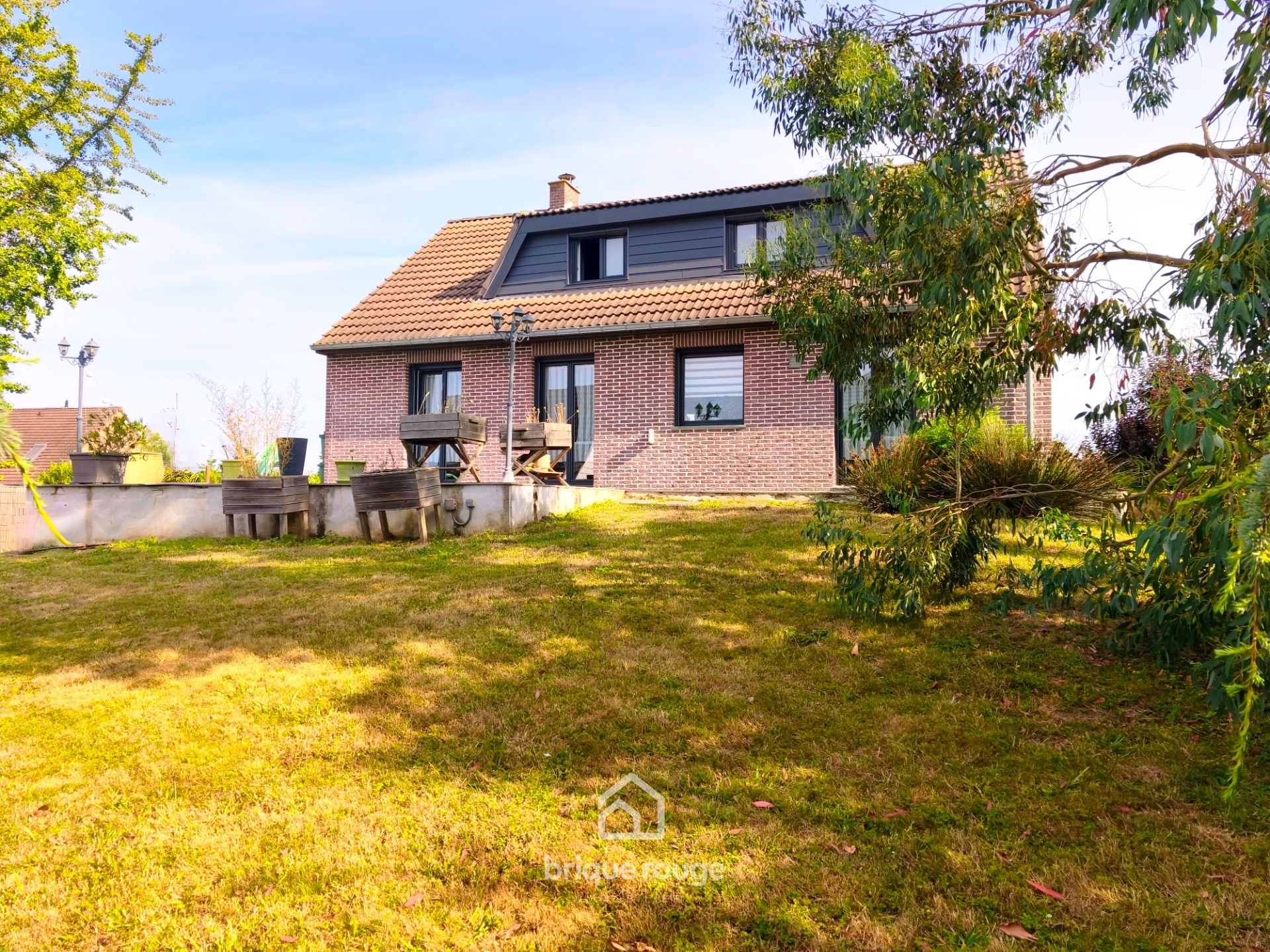 Maison individuelle familiale dans un quartier calme Photo 1 - Brique Rouge Immobilier Maison individuelle familiale dans un quartier calme Photo 1 - Brique Rouge Immobilier