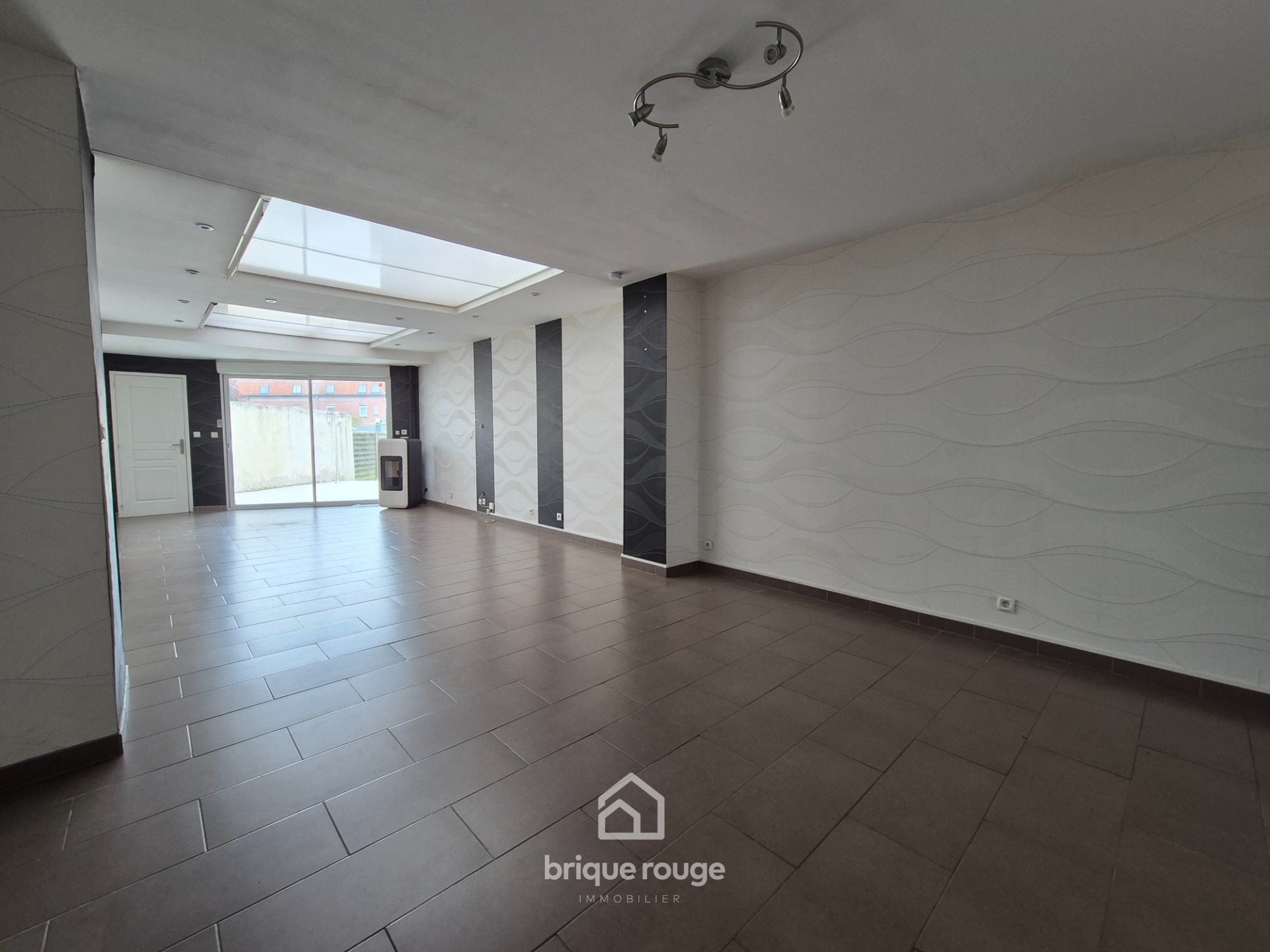 Jolie maison de 110 m 3 chambres jardin Photo 1 - Brique Rouge Immobilier