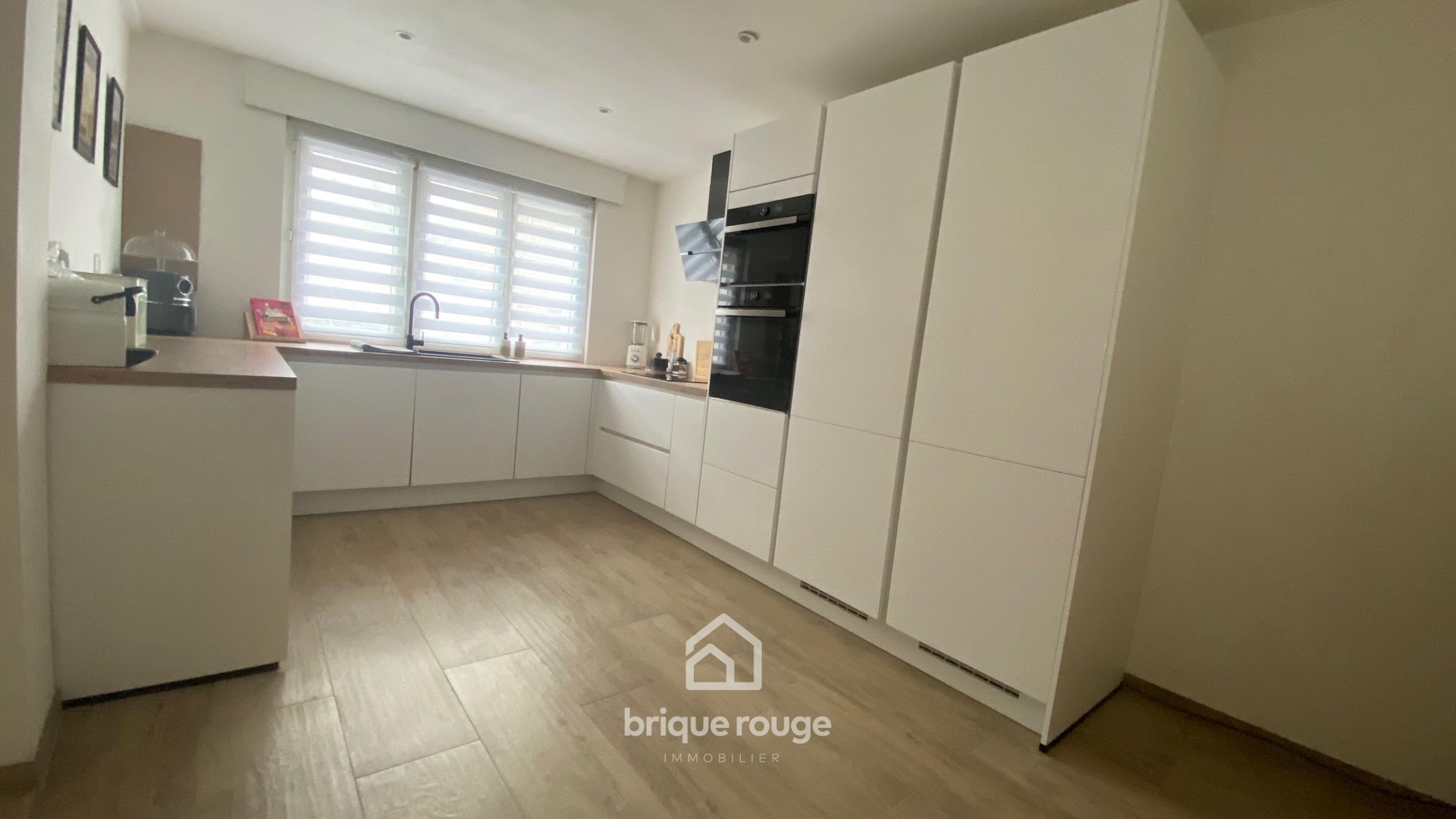 Maison renovee 3 chambres jardin parking Photo 3 - Brique Rouge Immobilier