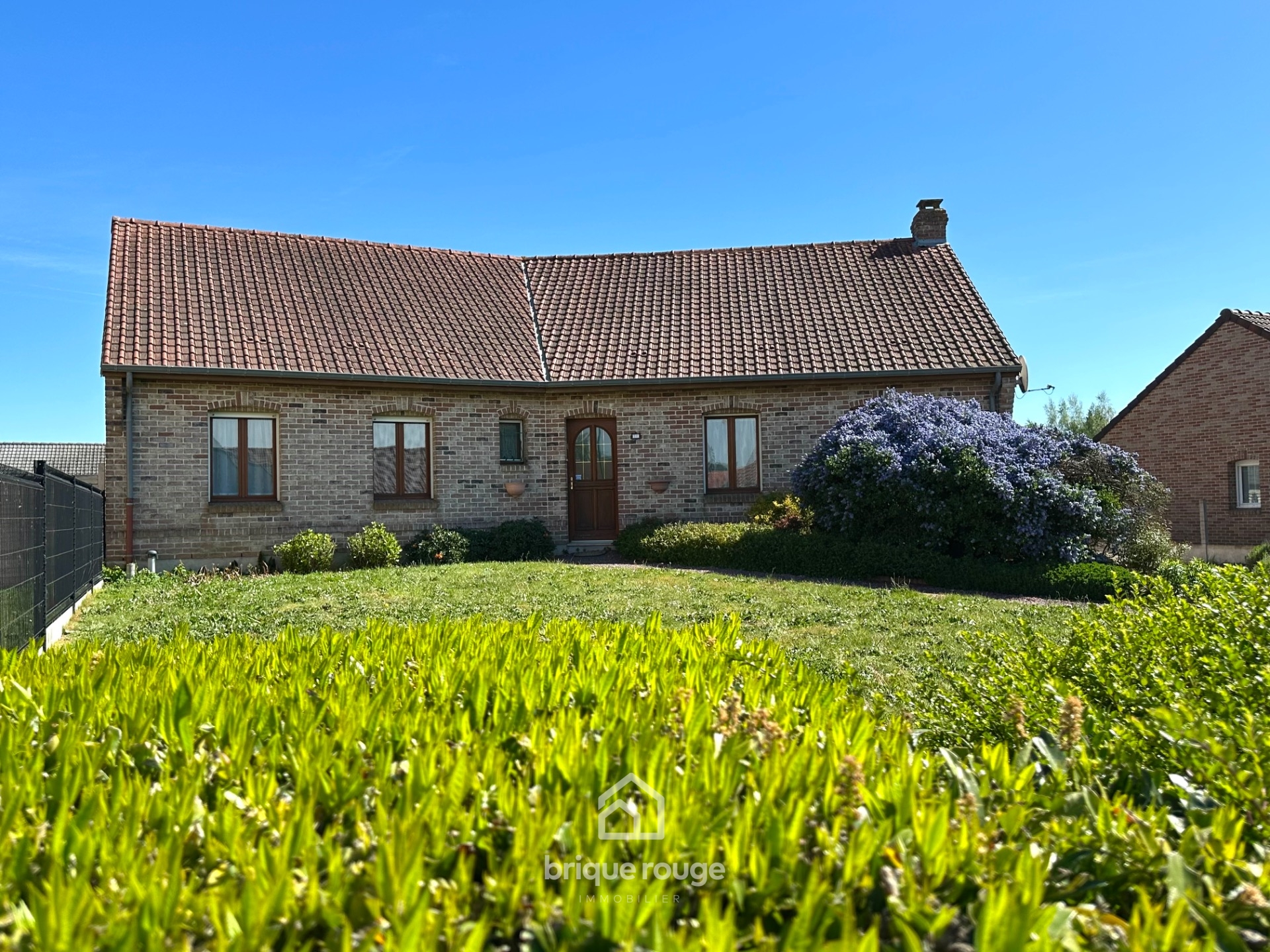 Charmant plain pied individuel sur sous sol complet Photo 1 - Brique Rouge Immobilier Charmant plain pied individuel sur sous sol complet Photo 1 - Brique Rouge Immobilier