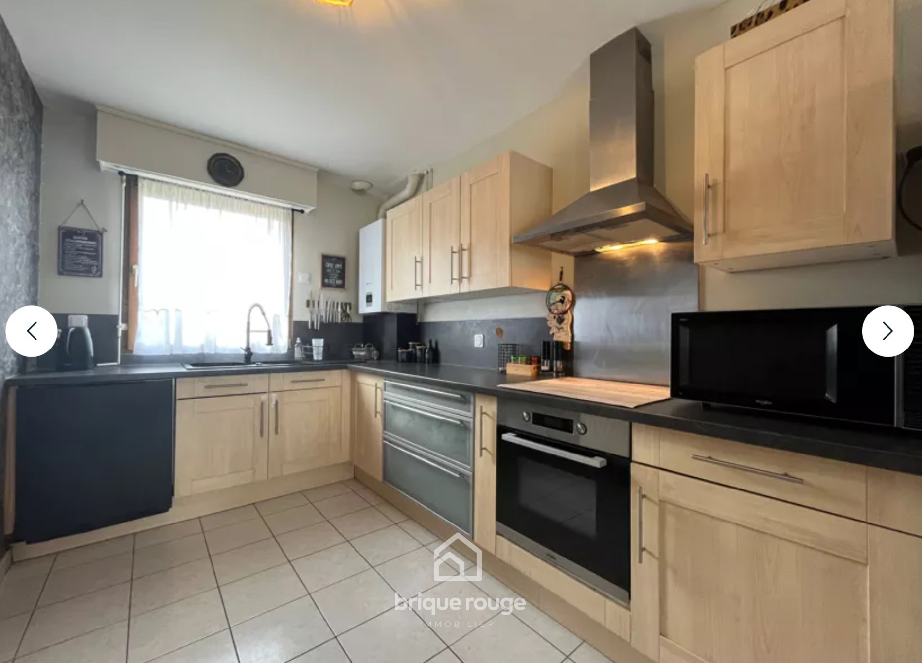 Maison semi individuelle 3 chambres Photo 3 - Brique Rouge Immobilier