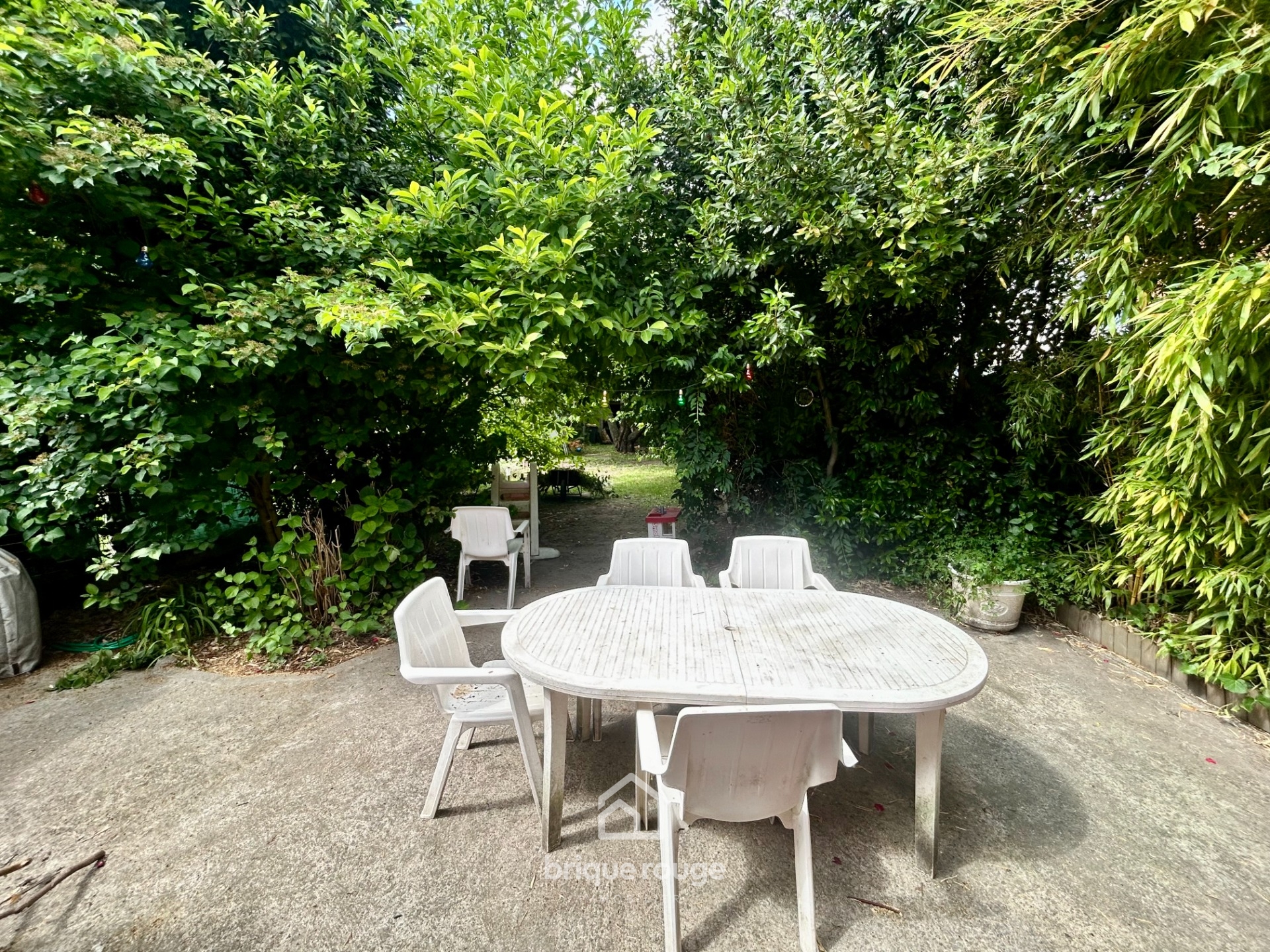 Maison semi individuelle avec jardin et garage Photo 6 - Brique Rouge Immobilier