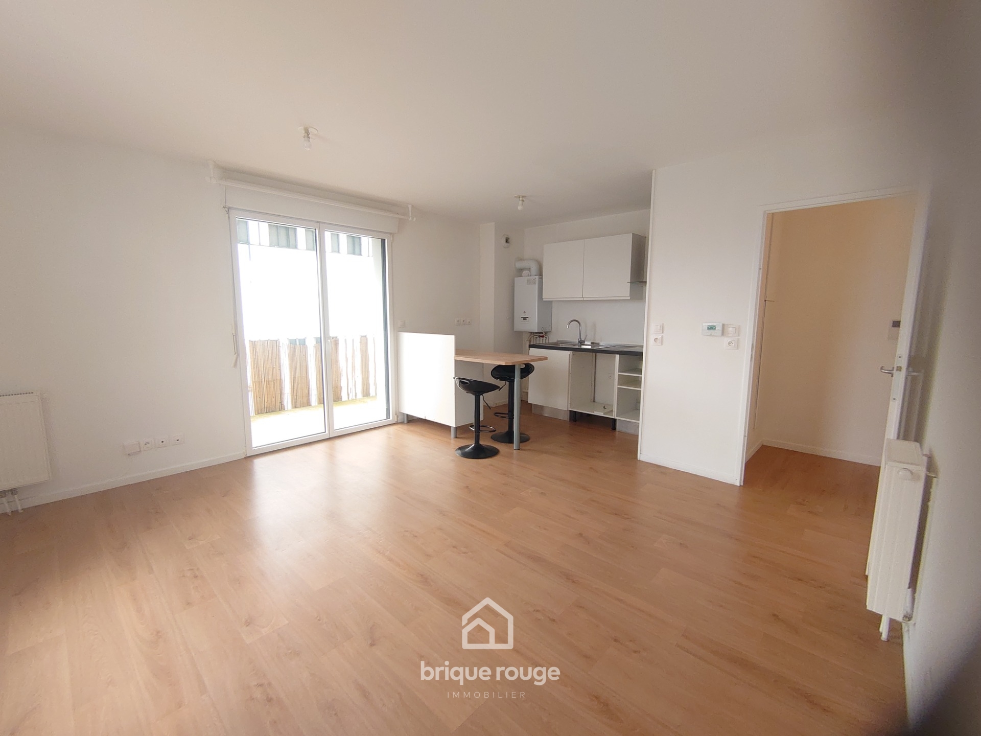 Superbe type 2 secteur chr avec jolie terrasse Photo 1 - Brique Rouge Immobilier