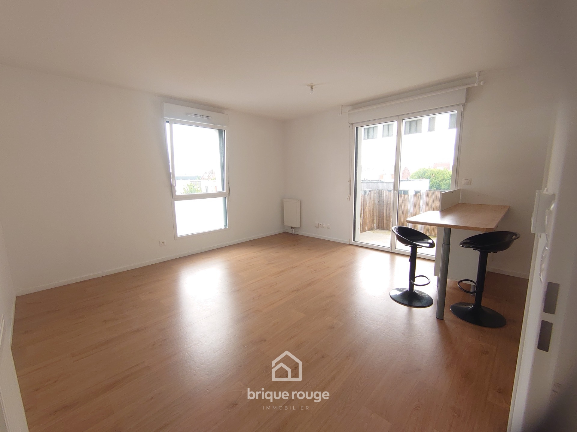 Superbe type 2 secteur chr avec jolie terrasse Photo 3 - Brique Rouge Immobilier