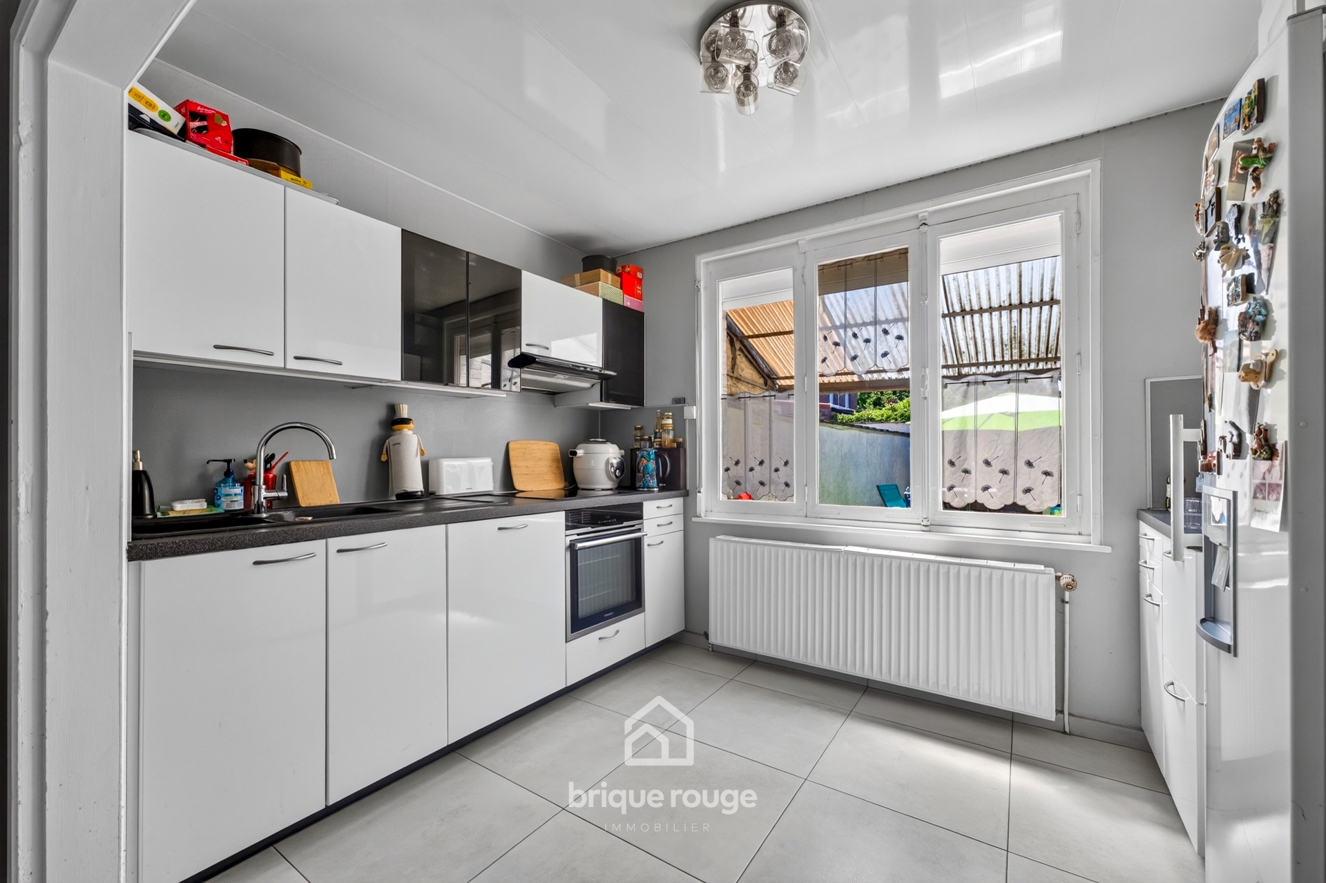 Maison de lotissement idealement situee Photo 2 - Brique Rouge Immobilier Maison de lotissement idealement situee Photo 2 - Brique Rouge Immobilier