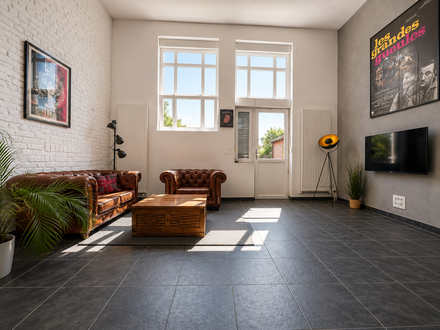 Loft idealement situee avec stationnements  Photo 1 - Brique Rouge Immobilier