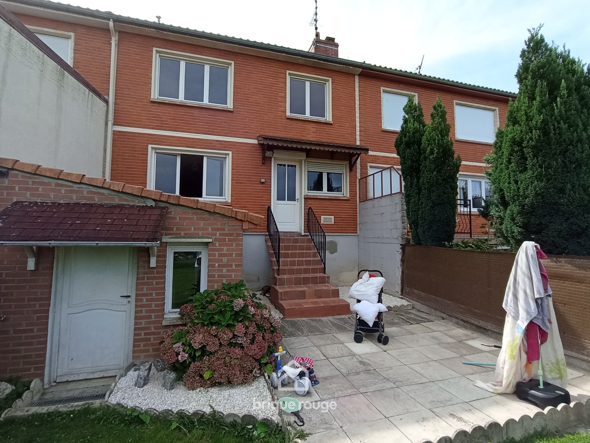 Maison de  lotissement  3 chambres sous sol garage Photo 1 - Brique Rouge Immobilier
