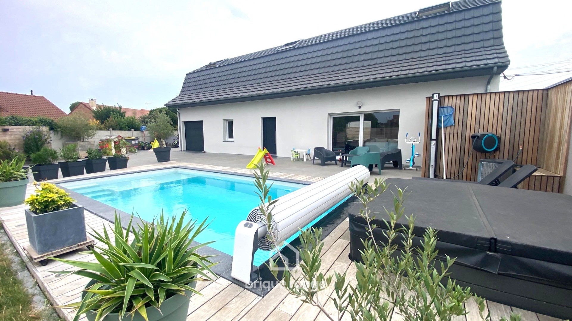 Magnifique maison avec piscine et jacuzzi  jardin garage Photo 1 - Brique Rouge Immobilier