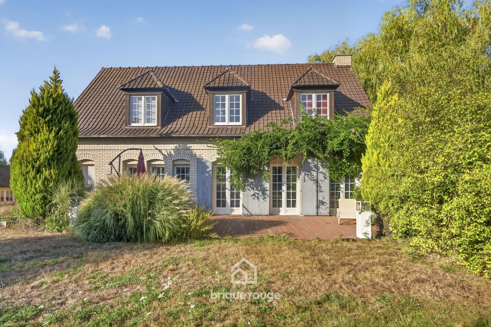 Superbe propriete de semi plain pied sur parc de 2000m Photo 1 - Brique Rouge Immobilier Superbe propriete de semi plain pied sur parc de 2000m Photo 1 - Brique Rouge Immobilier