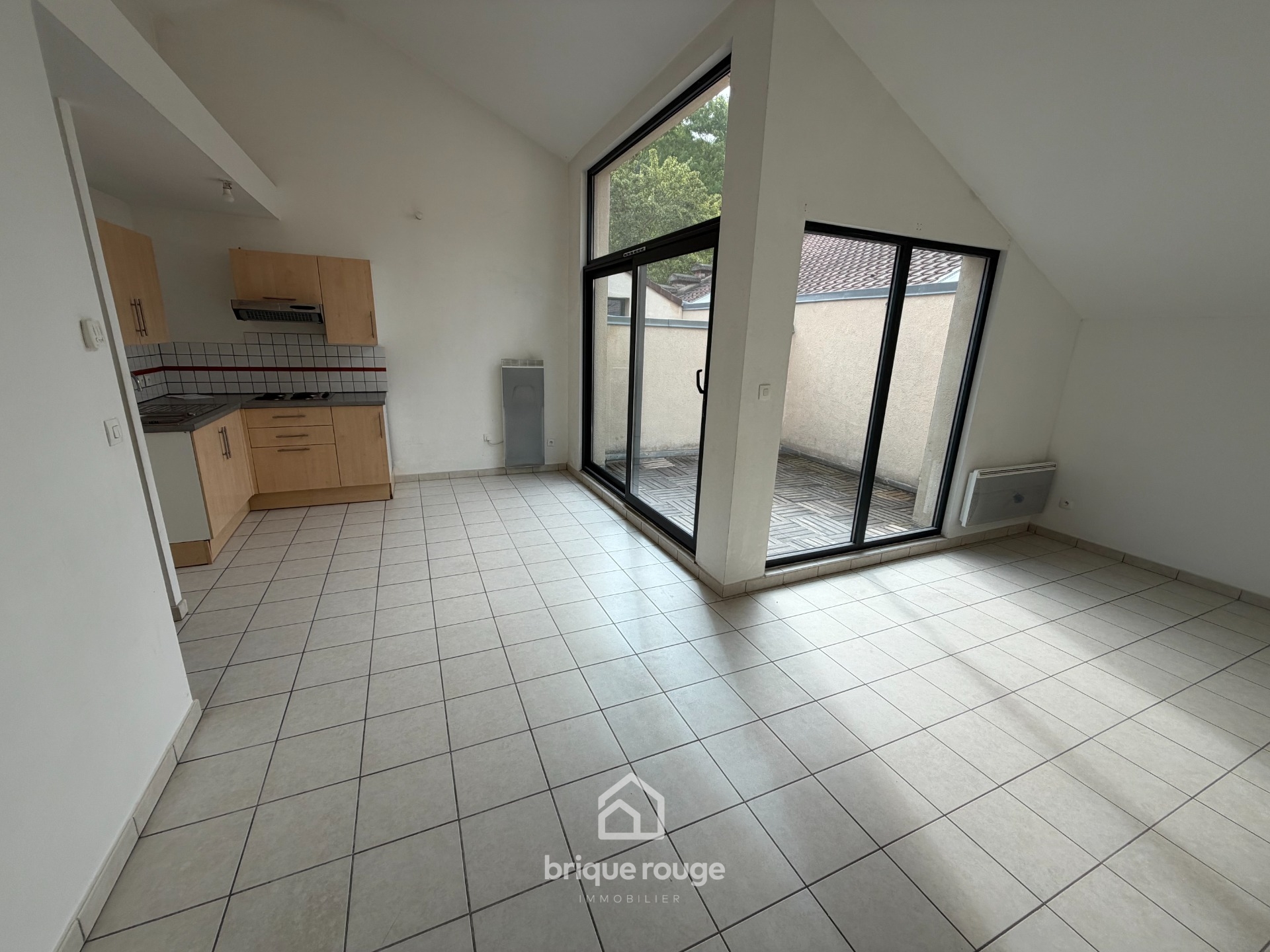 Bel appartement avec terrasse Photo 1 - Brique Rouge Immobilier Bel appartement avec terrasse Photo 1 - Brique Rouge Immobilier