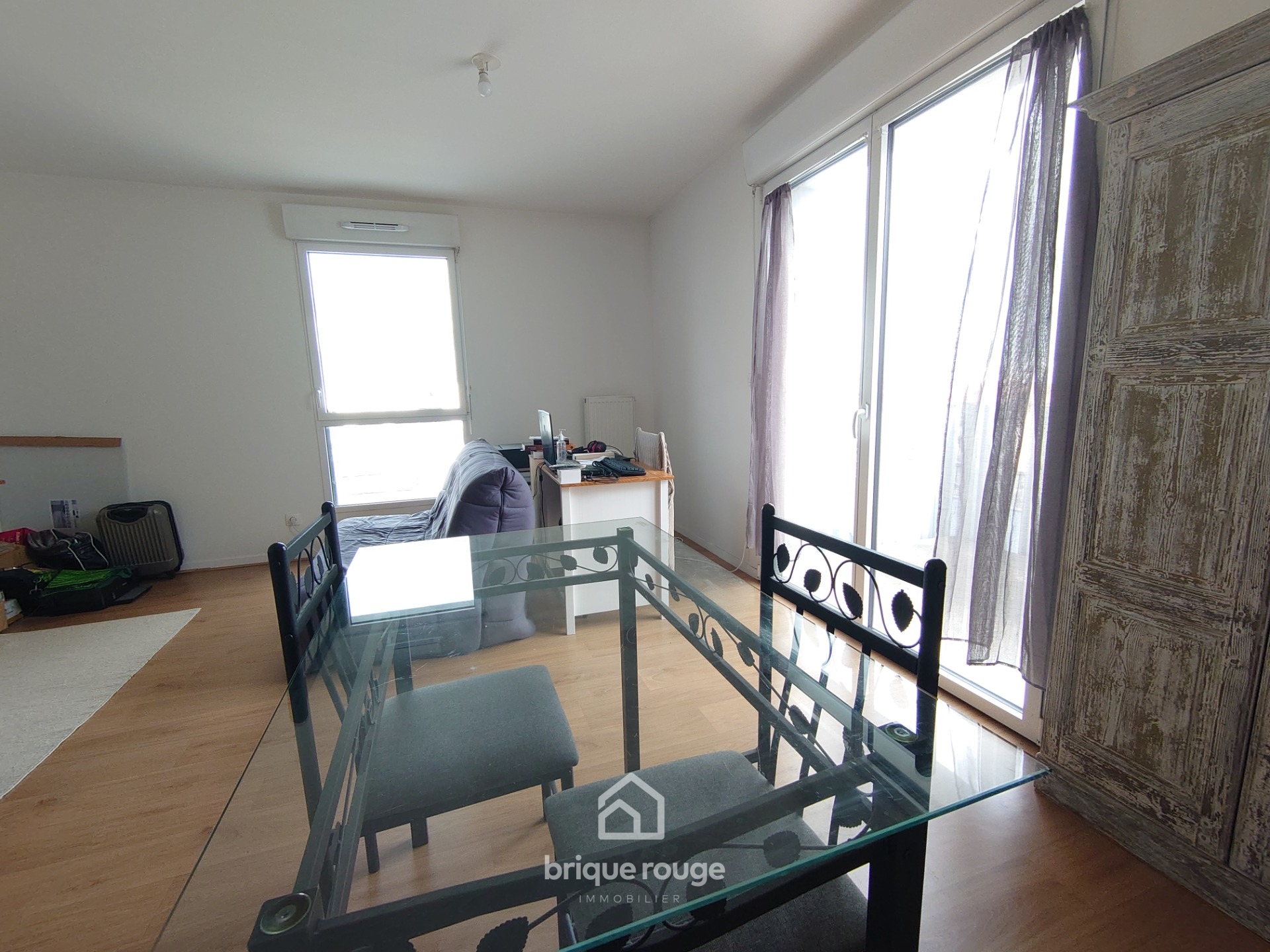 Magnifique t2 au dernier etage avec balcon et parking Photo 3 - Brique Rouge Immobilier