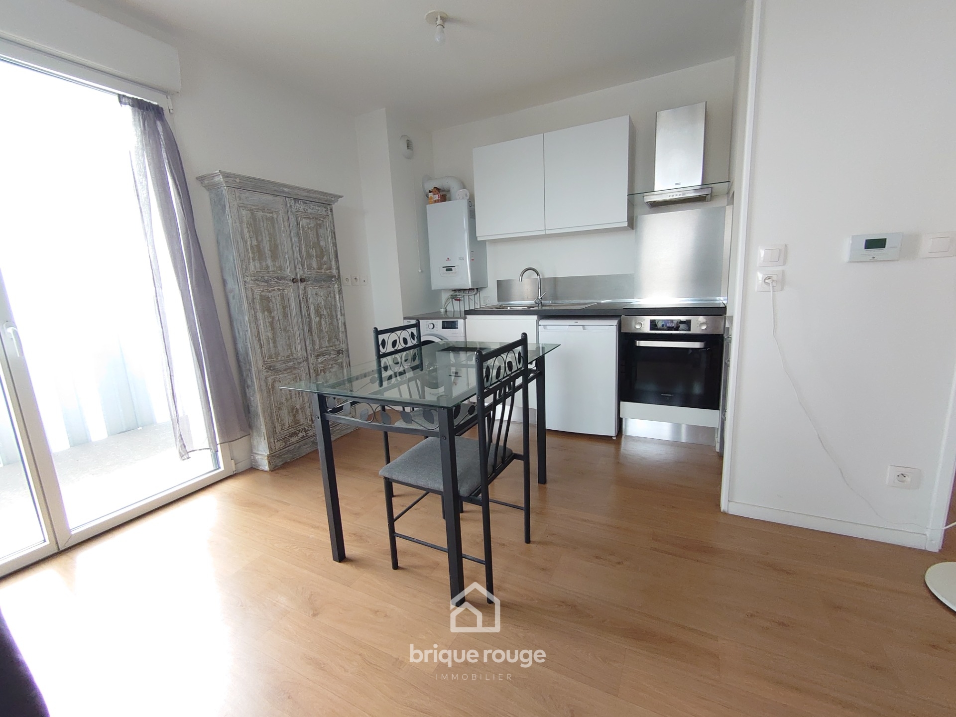 Magnifique t2 au dernier etage avec balcon et parking Photo 4 - Brique Rouge Immobilier