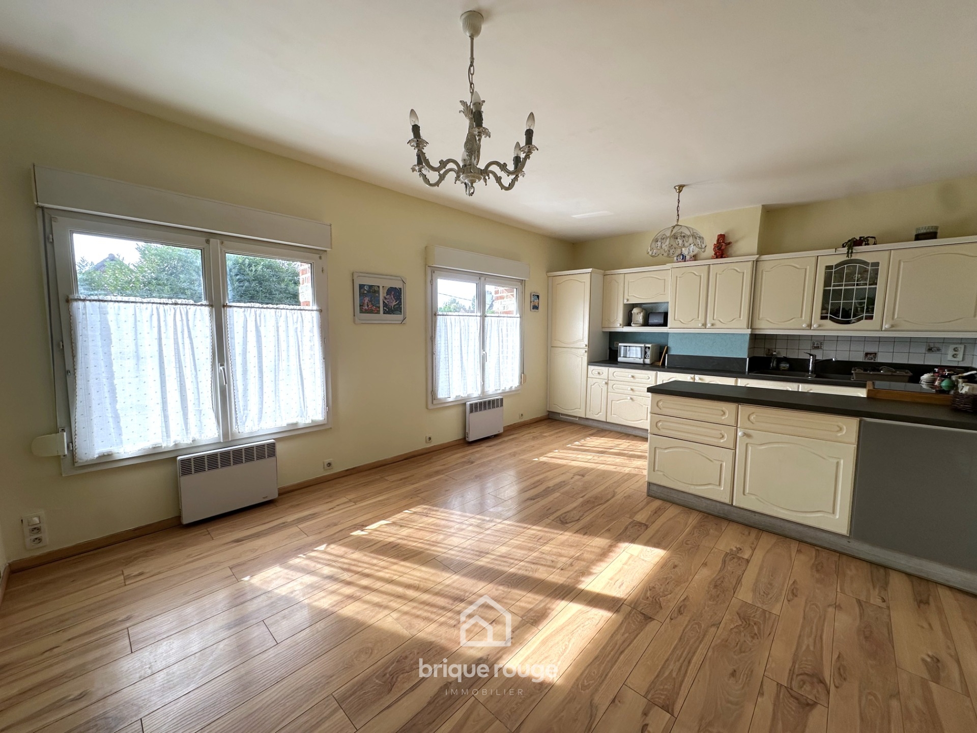 Maison bel etage avec son jardin privatif Photo 2 - Brique Rouge Immobilier