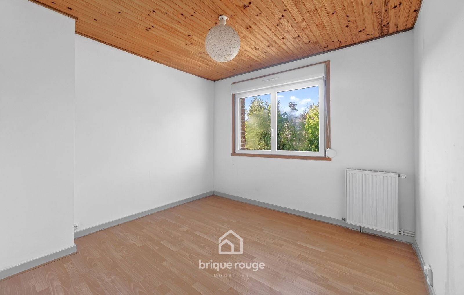 Maison semi individuelle 3 chambres et jardin Photo 11 - Brique Rouge Immobilier