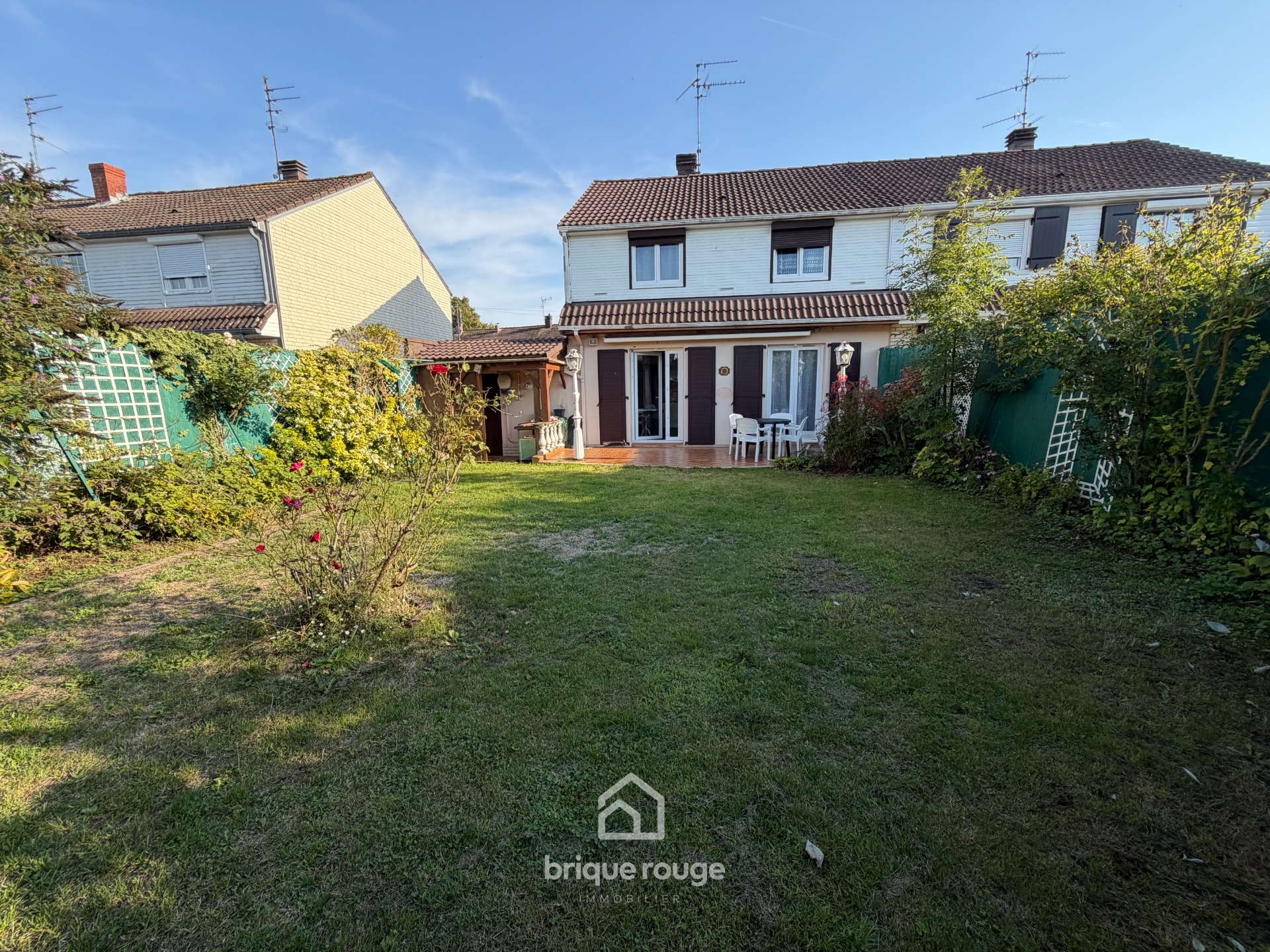 Jolie maison de lotissement Photo 1 - Brique Rouge Immobilier